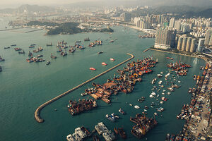 Huge volumes of sawn timber traded into the West through the Port of Hong Kong could be sourced from illegal and deforested forests, according to Forest Trends, which warns that the European Commission's new country classification list does little to end the trade of deforested products infiltrating European supply chains. (Photo Credit: Janusz Kolondra / Alamy Stock Photo)