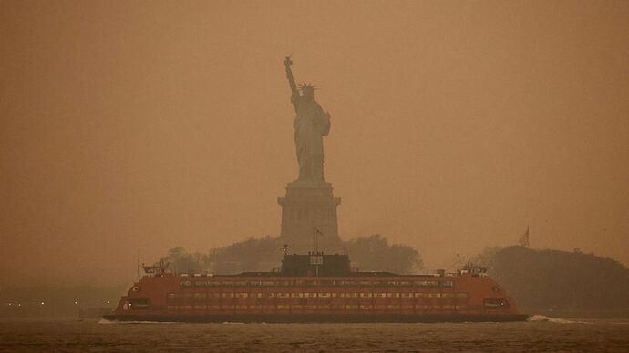 PHOTO: The Statue of Liberty is covered in haze and smoke caused by wildfires in Canada, in New York, U.S., June 6, 2023.