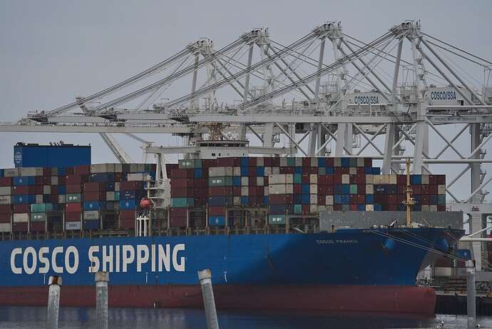 The "Cosco Shipping France" container ship is moored at the Long Beach Container Terminal, LBCT, at Middle Harbor in the Port of Long Beach, Calif., Tuesday, April 15, 2025.