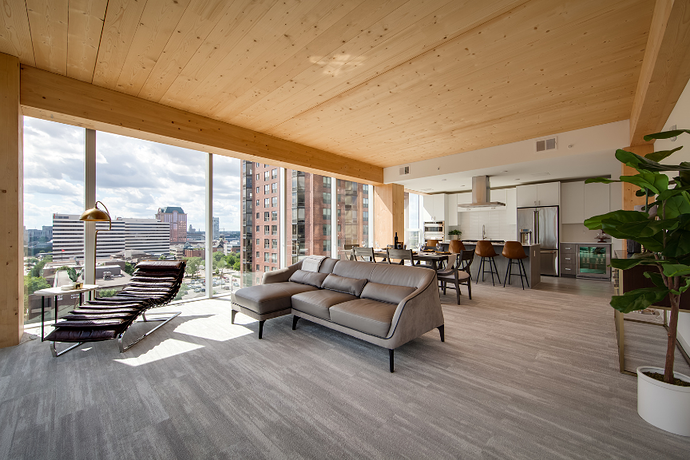 Interior view of a multifamily living space constructed from mass timber
