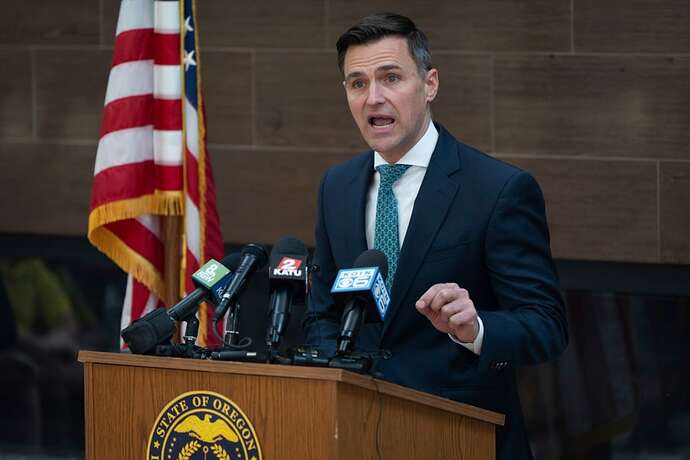 Oregon Attorney General Dan Rayfield speaks during a news conference at the Oregon Department of Justice office on Wednesday, April 23, 2025, in Portland, Ore.