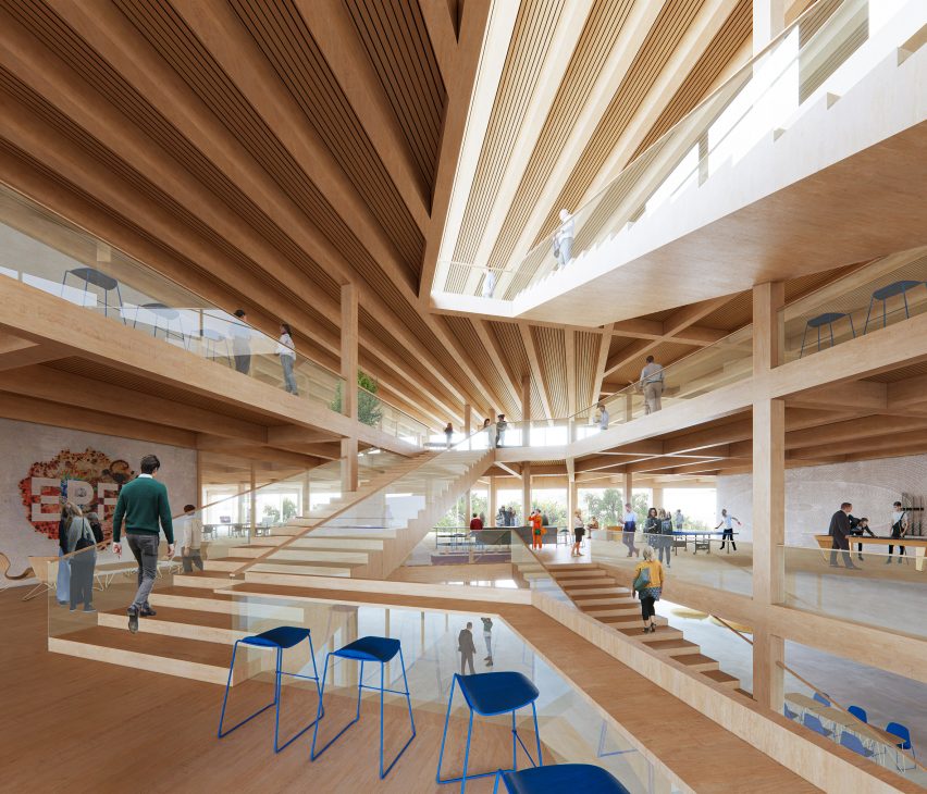 Guests walking around light multi-level timber Ecotope by 3XN
