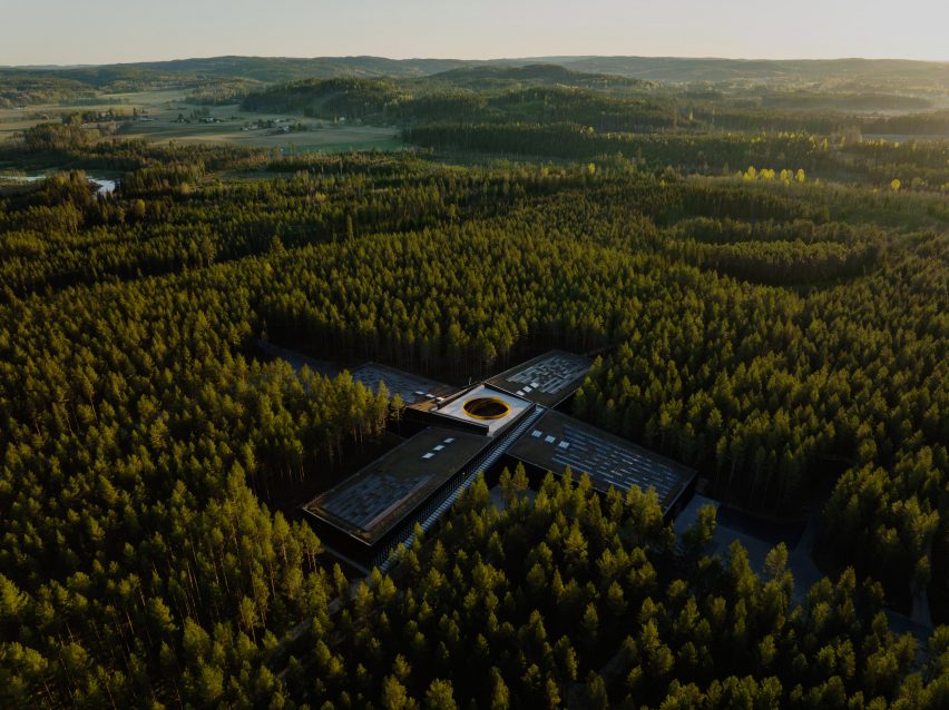 Birde-eye view of The Plus furniture factory by BIG for Vestre in a forest