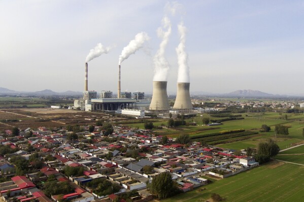 Guohua Power Station, a coal-fired power plant, operates in Dingzhou, Baoding, in the northern China's Hebei province, Nov. 10, 2023. (AP Photo/Ng Han Guan, File)